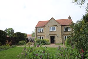 Main elevation- click for photo gallery